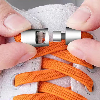 Orange shoelaces with metal press lock being used on a white sneaker, against a red and blue background with text.